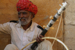 Musician playing the Ravanatthi instrument from Rajasthan-