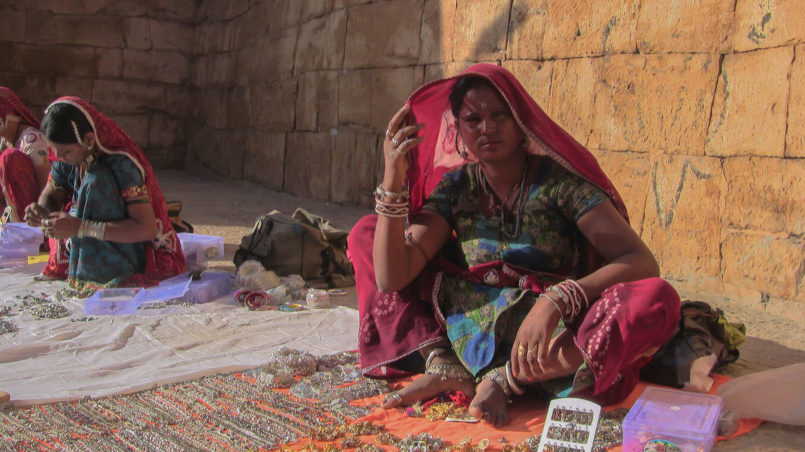 Women selling jewellery at local market, Jasailmer-